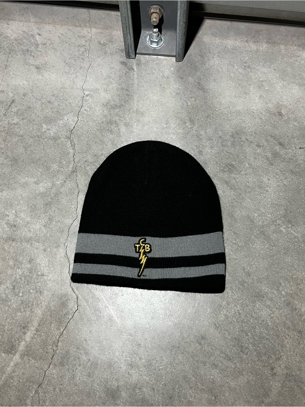 T F B Black Knit Beanie with Gray Stripes and Yellow Embroidered Logo